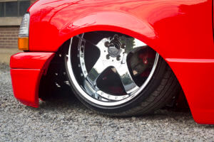 TWENTY-TWO-INCH AMERICAN RACING WHEELS TUCK NICELY INTO THE RANGER’S FENDERS.