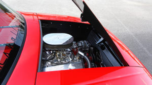 THE CORVETTE STINGRAY-INSPIRED HOOD FLIPS UP AND EXPOSES THE SBC 350-CI MOTOR AND A TON OF SHINY DRESS-UP ACCESSORIES. 