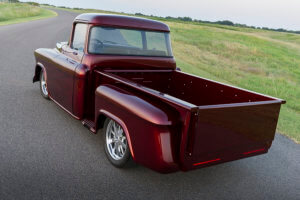 custom roll pan with led lights on the rear of the custom apple candy red 1955 chevy.