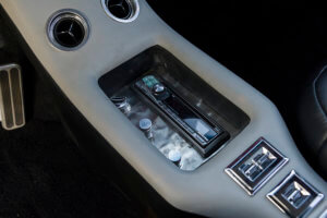 THE WINDOW AND LOCK CONTROLS ARE LOCATED IN THE CENTER CONSOLE IN ADDITION TO THE ALPINE HEAD UNIT.