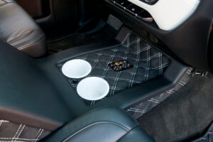 Detail of the interior showing quilted leather on the part housing the truck's cup holders