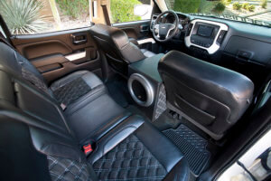 THE INSIDE OF THE TRUCK IS ALL LEATHER AND SUEDE, AND THANKS TO THE DIAMOND STITCH PATTERN, IT LOOKS LIKE IT BELONGS IN A SUPERCAR. 