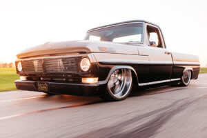 Julio Garcia's custom 1970 Ford F-100 running on the street.