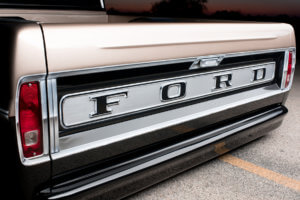 THOUGH THE EXTERIOR OF THE F-100 APPEARS TO BE STOCK WITH ALL OF THE ORIGINAL TRIM AND EMBLEMS, IT WAS ALL AIRBRUSHED AND BURIED UNDER CLEARCOAT.
