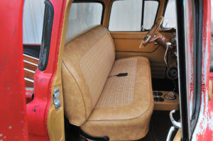 Reupholstered interior with plaid inserts on the seats, shifter and door panels.