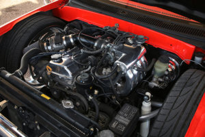 An ultra reliable toyota 22R 2.4L sits inside the engine bay.