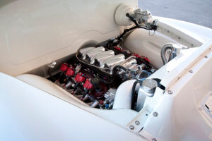 LS1 transplant tucked away underneath the hood. The motor has also been painted to match the chassis and interior.