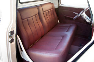 Brandy-Colored leather upholstery and custom door panels.