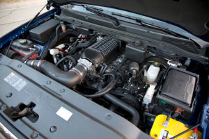 Large Whipple supercharger in the engine bay.