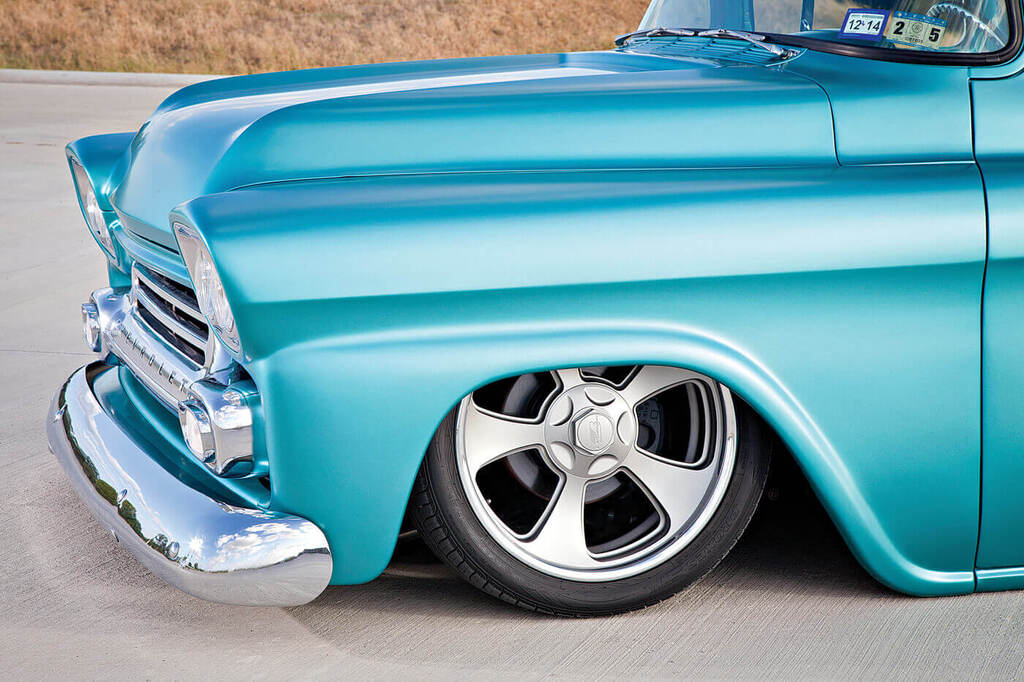 The Billet Specialties Vintec 20-inch wheels with painted centers that resemble old-school Halibrand wheels helped create the retro-mod styling. 