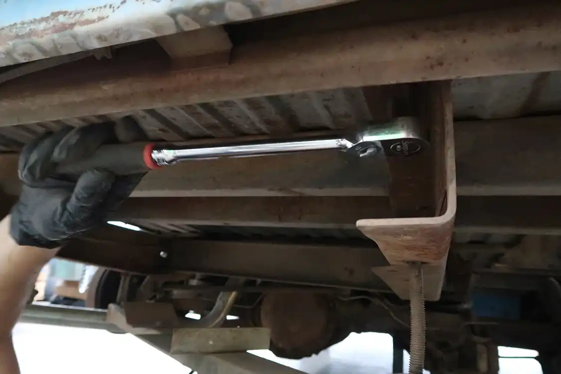 Kyle from Metalox Fabrication started removing the bed bolts