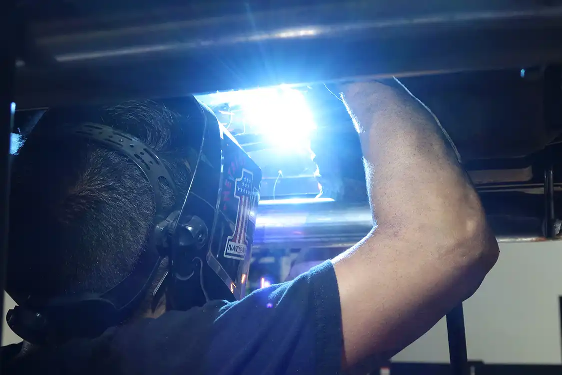 Kyle burns them in, ensuring that the frame is solid as a rock