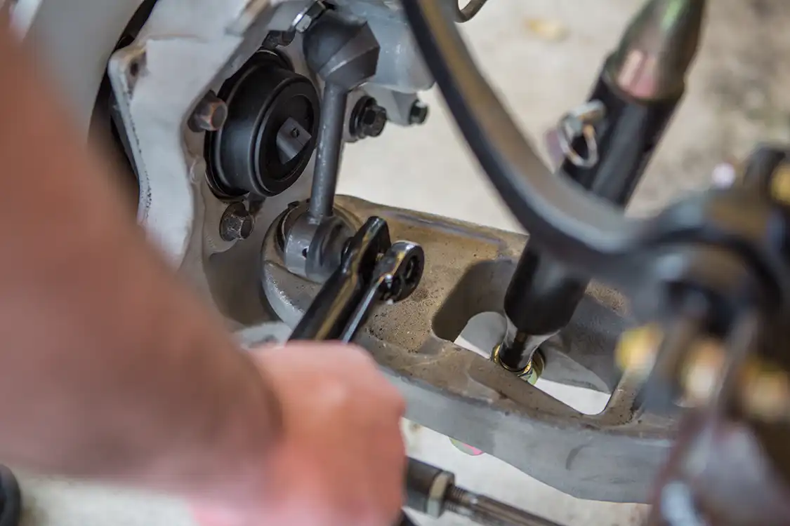 We removed the nut on the sway bar end link and holding the sway bar to the crossmember to be able to remove the sway bar