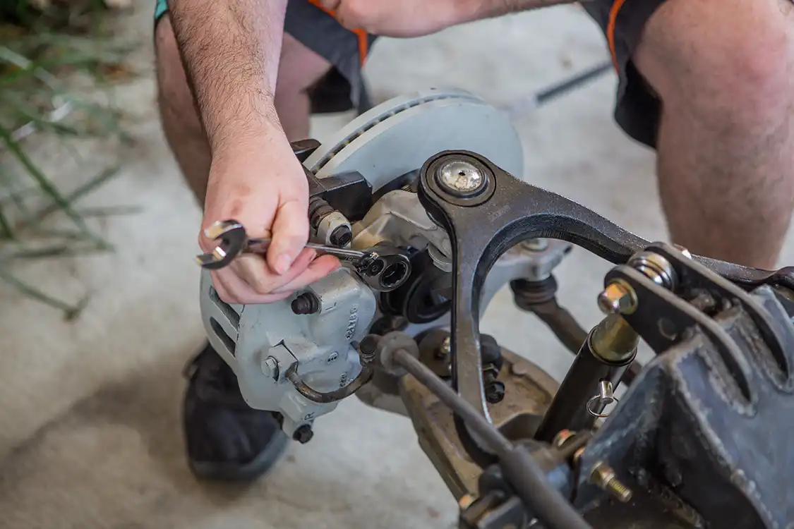 removed the bolts holding the brake caliper