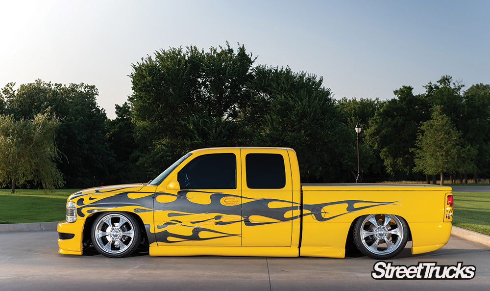 Lowered yellow 2000 Chevy Silverado 