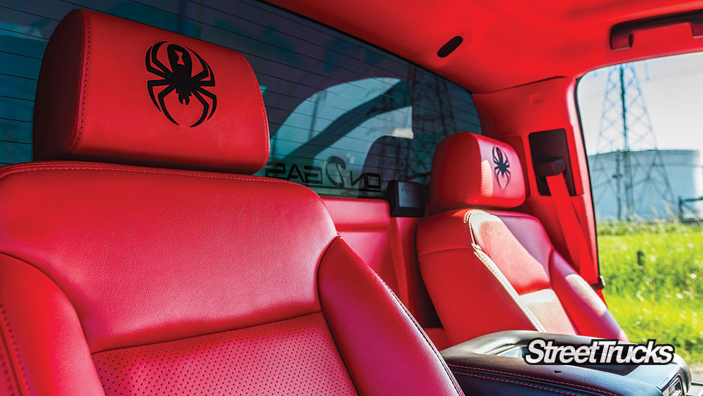 Red interior inside of a 2016 Chevy Silverado