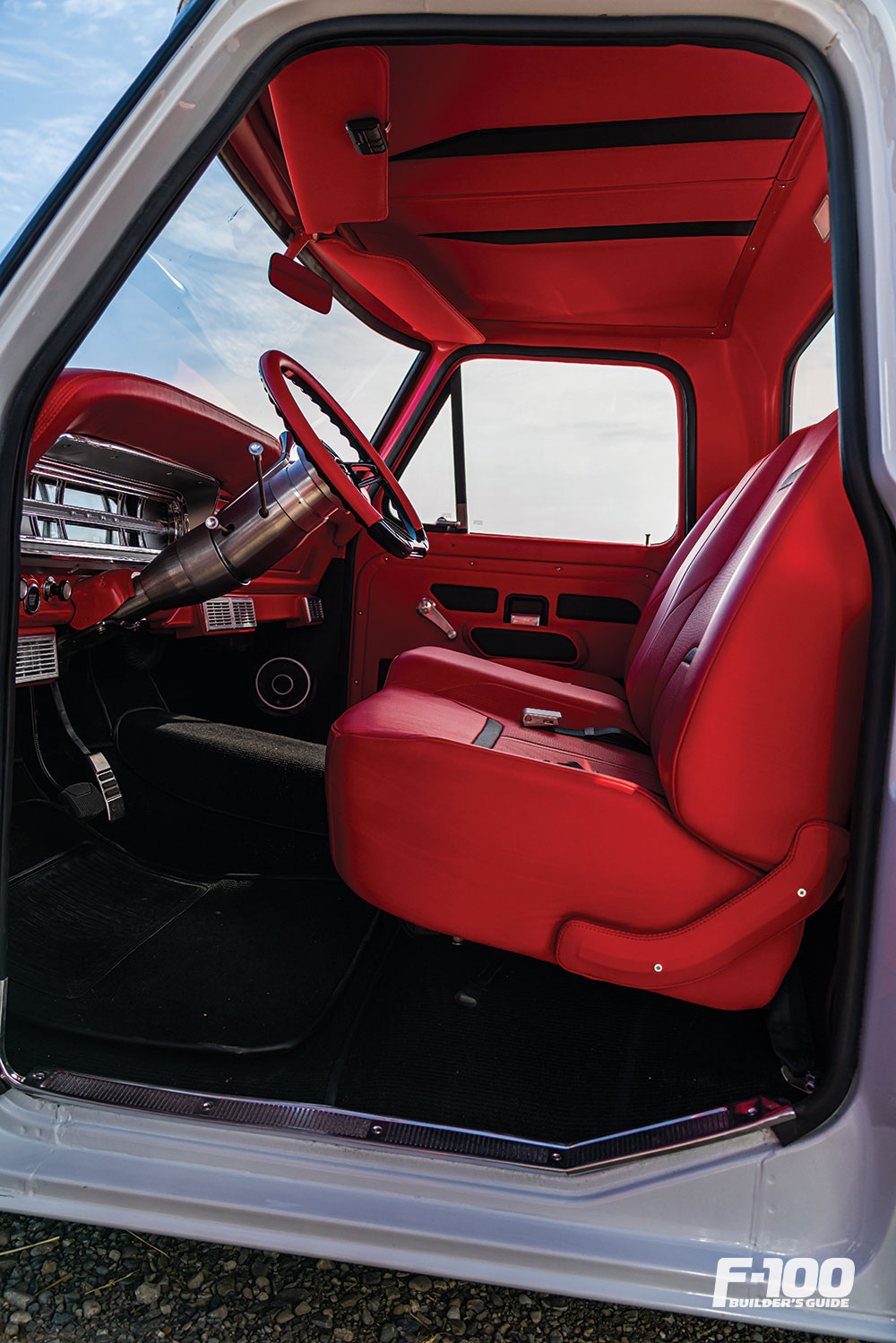 Black stitched carpet and custom leather headliner