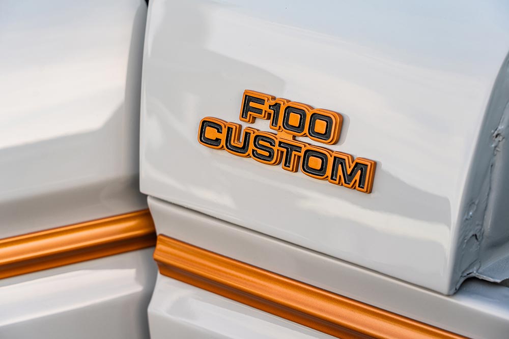 Orange 1978 Ford F-100 pickup emblem