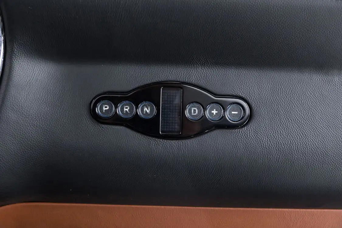 Dash mounted push button shifter