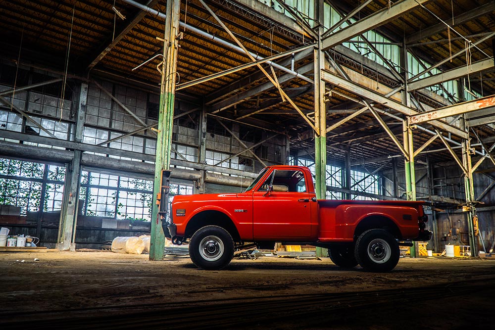 Lifted orange 1971 Chevy C10 Cheyenne