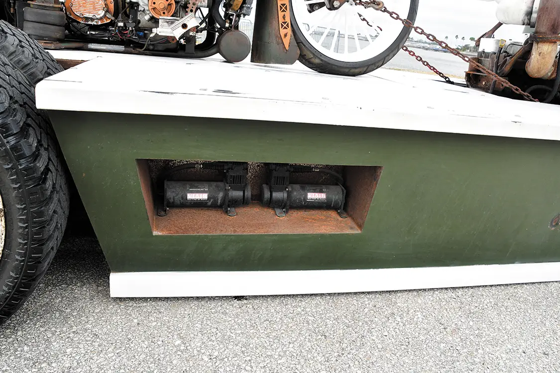 This COE Flatbed Hauls a Diesel-Powered Rat Bike
