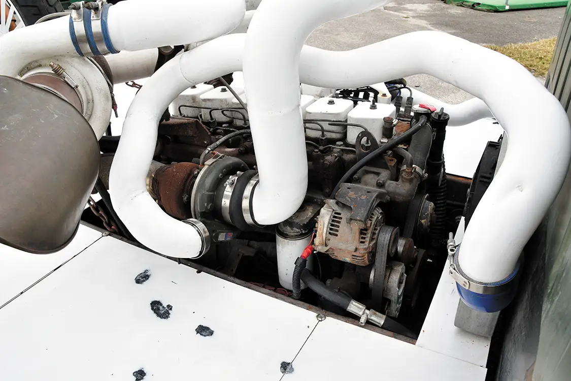 This COE Flatbed Hauls a Diesel-Powered Rat Bike